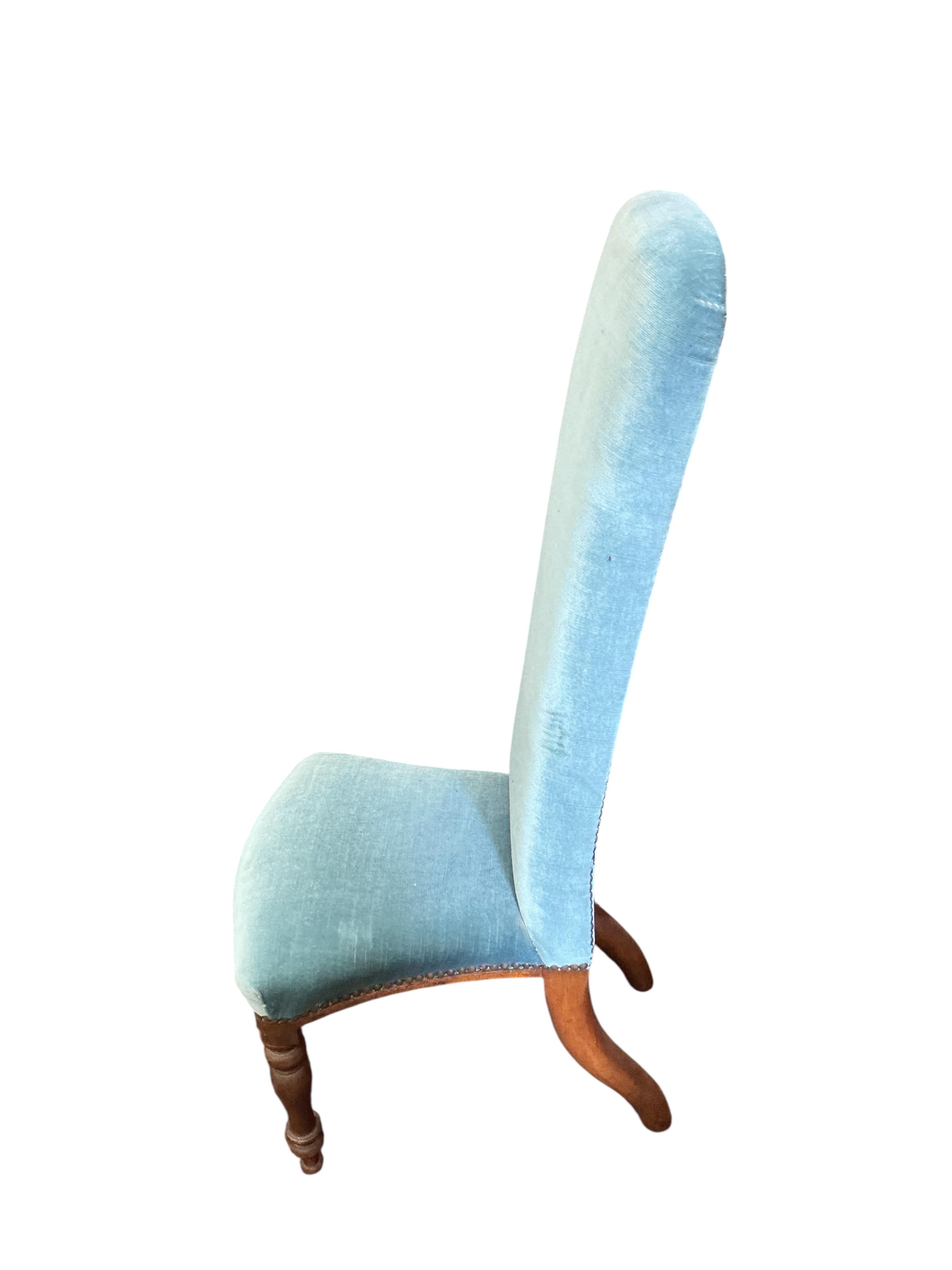 A Victorian upholstered mahogany nursing chair together with a Victorian prie dieu chair